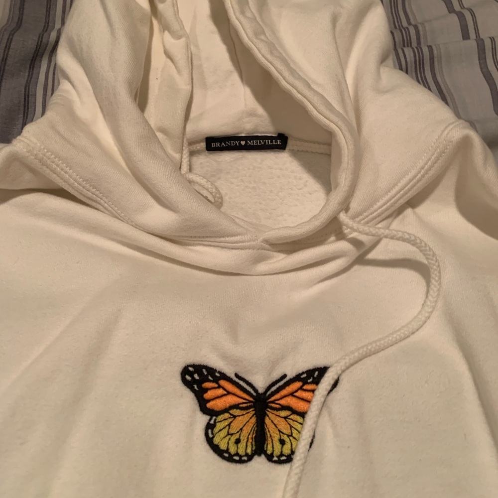 Brandy Melville monarch buttery hoodie never worn.